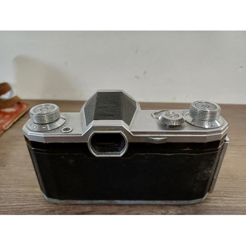 678 - Two cased Zeiss Ikon items, one mid 20th century Pentacon (export branding) Zeiss Ikon Contax D 35mm... 