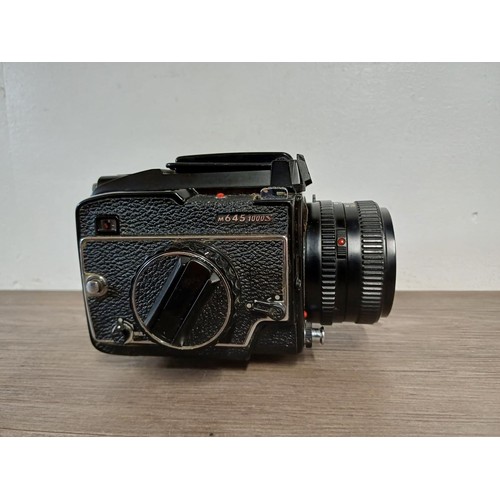 680 - A mid 1970s Mamiya M645 1000S 4.5 x 6 medium format SLR camera fitted with Mamiya-Sekor C 80mm 1:2.8... 