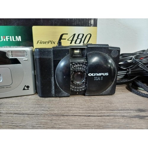 681 - Five items to include Olympus ∞ Stylus Zoom 105 (µ[mju:] Zoom 105) compact 35mm camera, Olympus XA1 ... 