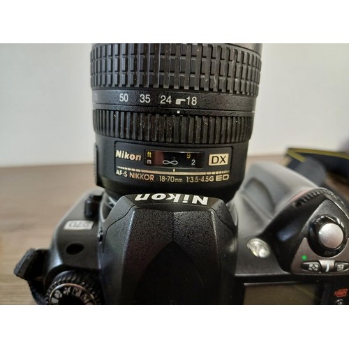 682 - A cased Nikon D70 digital camera fitted with Nikon DX AF-S Nikkor 18-70mm 1:3.5-4.5G ED lens with ca... 