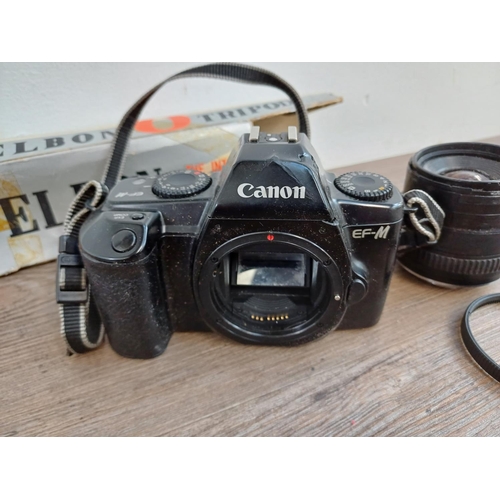 696 - Six items to include Pentacon Praktica Super TL1000 35mm SLR camera fitted with 1.8/50 lens, Canon E... 