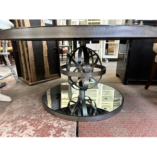 60 - A brushed steel and mirrored glass circular coffee table - approx. 61cm high x 130cm diameter