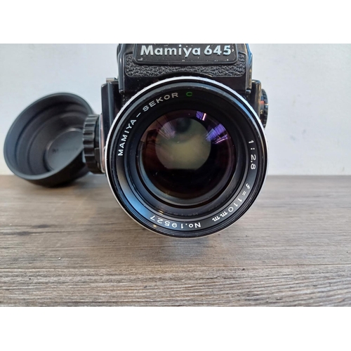 691 - A mid 1970s Mamiya M645 1000S 4.5 x 6 medium format SLR camera fitted with Mamiya-Sekor C 110mm 1:2.... 