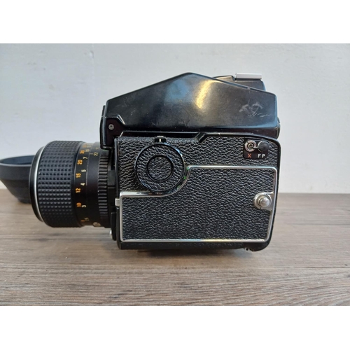 691 - A mid 1970s Mamiya M645 1000S 4.5 x 6 medium format SLR camera fitted with Mamiya-Sekor C 110mm 1:2.... 