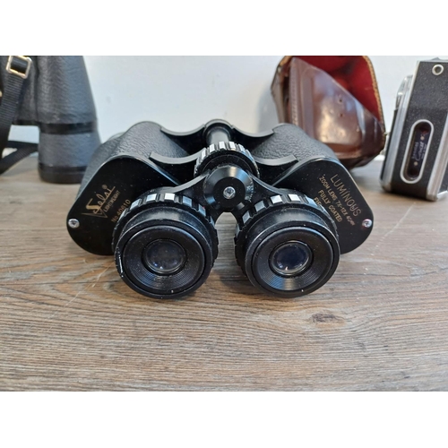 698 - A collection of cameras and binoculars to include cased Olympus iS-3000 35mm bridge camera, Canon AF... 