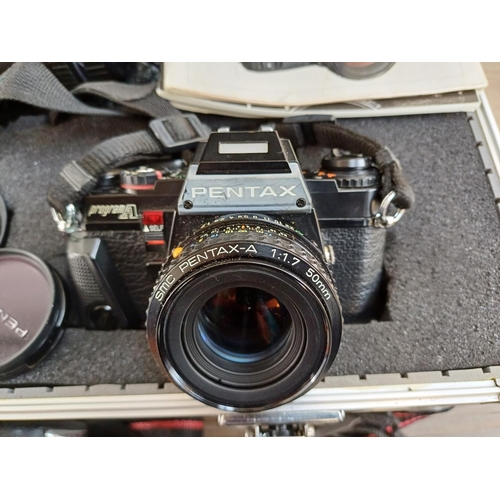 701 - An aluminium flight case containing Pentax 35mm cameras and lenses, Super A SLR fitted with 1:1.7 50... 