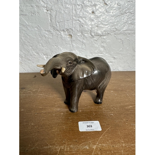 303 - A Beswick Elephant Trunk Stretching figurine - model no. 974