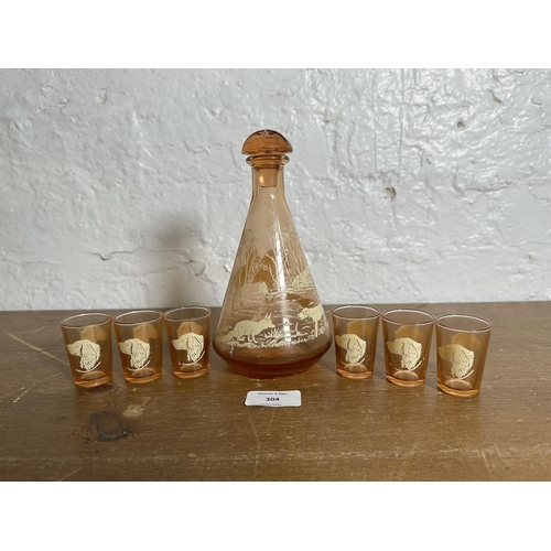 304 - A mid 20th century Art Deco style French peach glass seven piece drinking set with enamelled hunting... 