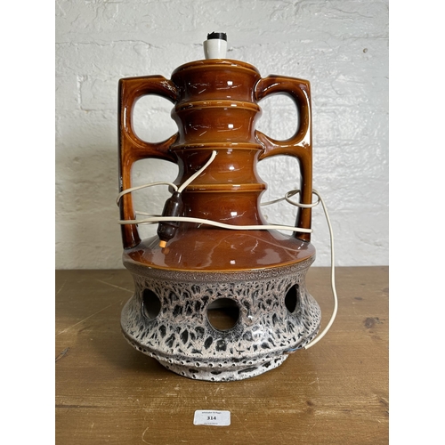 314 - A mid 20th century West German Fat Lava pottery twin handled table lamp - approx. 45cm high