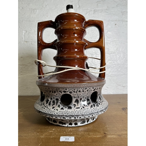 314 - A mid 20th century West German Fat Lava pottery twin handled table lamp - approx. 45cm high