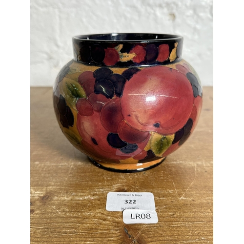 322 - A Moorcroft style Pomegranate pattern tubelined vase - approx. 12cm high