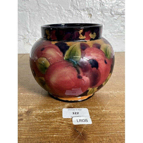 322 - A Moorcroft style Pomegranate pattern tubelined vase - approx. 12cm high