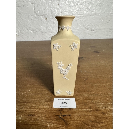 325 - A Wedgwood primrose yellow Jasperware bud vase - approx. 13.5cm high