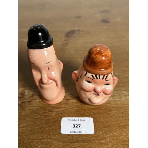 327 - A pair of Beswick Laurel and Hardy salt and pepper shakers - largest approx. 10cm high