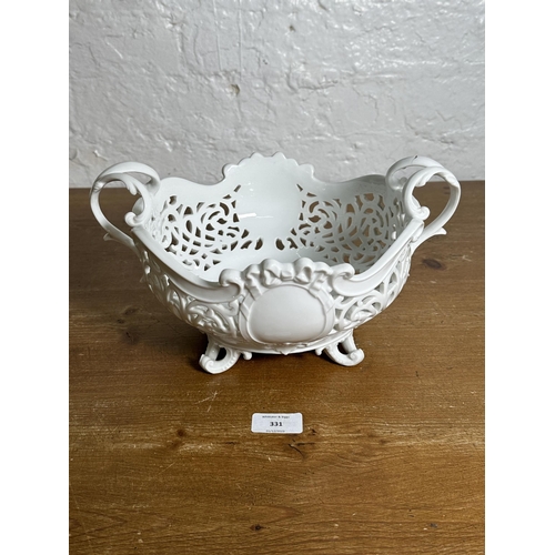 331 - An antique Meissen reticulated porcelain twin handled fruit bowl - approx. 17cm high x 30cm wide