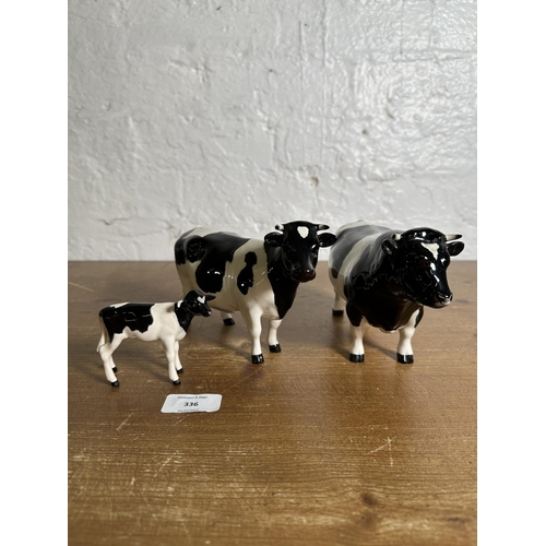 336 - Three Beswick Friesian Cattle figurines, Claybury Leegwater Cow no. 1362A, Calf no. 1249C and CH. Co... 