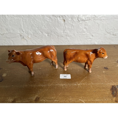 342 - Two Beswick Highland Calf figurines