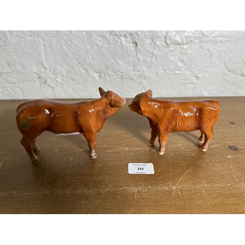 342 - Two Beswick Highland Calf figurines