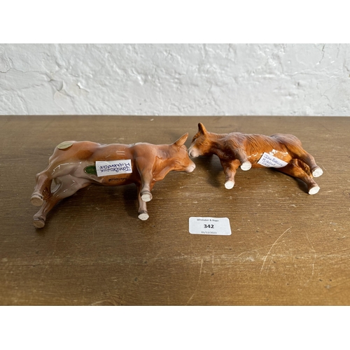 342 - Two Beswick Highland Calf figurines