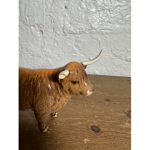 344 - Three Beswick Highland Cattle figurines, Bull no. 2008, Cow no. 1740 and Calf no. 1827