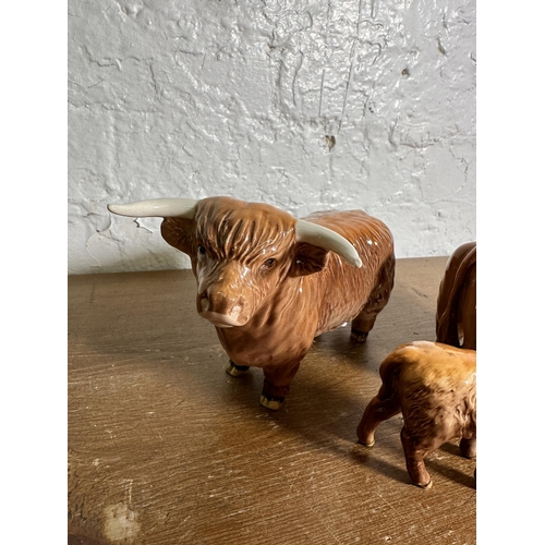 344 - Three Beswick Highland Cattle figurines, Bull no. 2008, Cow no. 1740 and Calf no. 1827