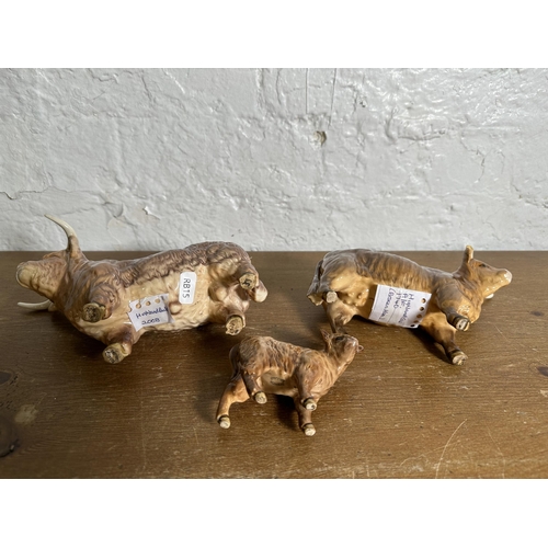 344 - Three Beswick Highland Cattle figurines, Bull no. 2008, Cow no. 1740 and Calf no. 1827