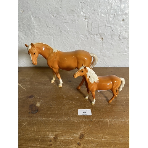 358 - Two Beswick Palomino horse figurines, Mare Facing Left no. 976 and Pony Head Up no. 1197