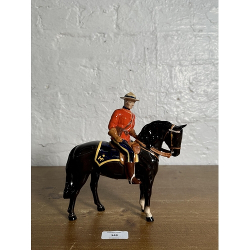 348 - A Beswick Canadian Mountie figurine, no. 1375 - approx. 21cm high