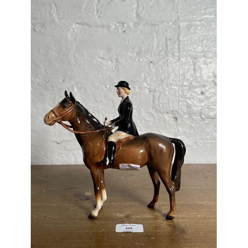 349 - A Beswick Huntswoman on brown horse figurine, no. 1730 - approx. 21cm high