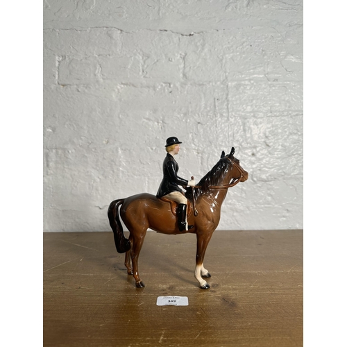 349 - A Beswick Huntswoman on brown horse figurine, no. 1730 - approx. 21cm high