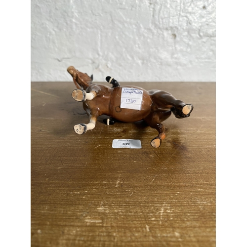 349 - A Beswick Huntswoman on brown horse figurine, no. 1730 - approx. 21cm high