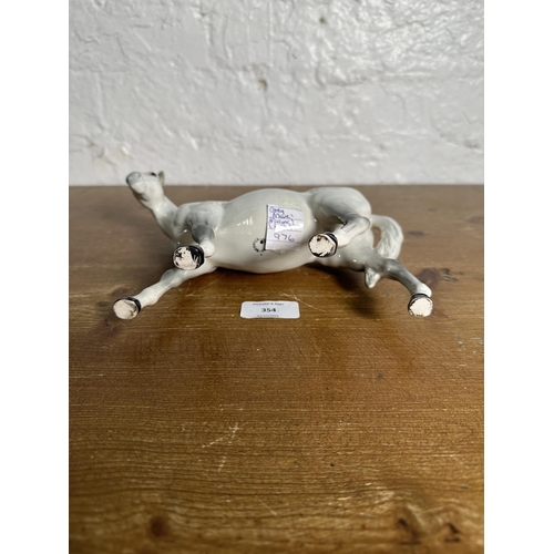 354 - A Beswick Mare Facing Left dapple grey horse figurine, no. 976 - approx. 17cm high