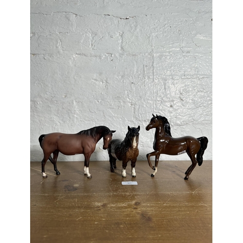 367 - Three ceramic horse figurines, one Royal Doulton and two Beswick