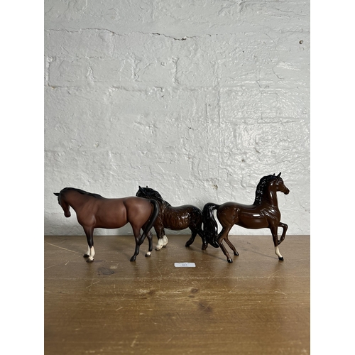 367 - Three ceramic horse figurines, one Royal Doulton and two Beswick