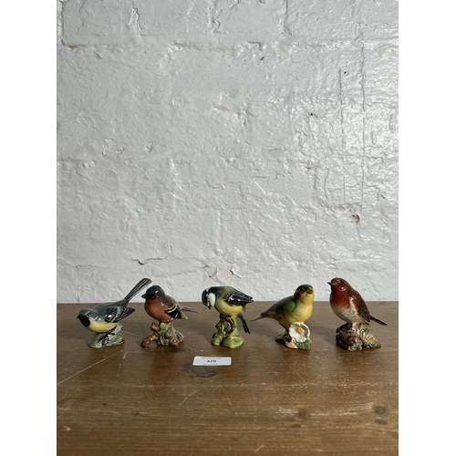 370 - Five Beswick bird figurines to include Robin, Greenfinch, Grey Wagtail etc.