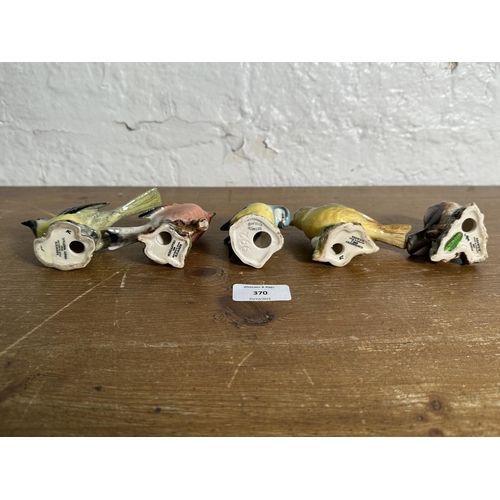 370 - Five Beswick bird figurines to include Robin, Greenfinch, Grey Wagtail etc.