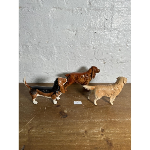 378 - Three ceramic dog figurines, one Goebel Cocker Spaniel CH 623 and two Beswick, Golden Retriever Cabu... 