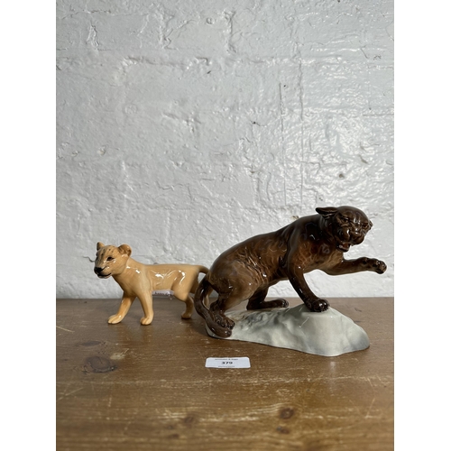 379 - Two Beswick wild cat figurines, Puma on Rock no. 1823 and Lion Cub no. 2098