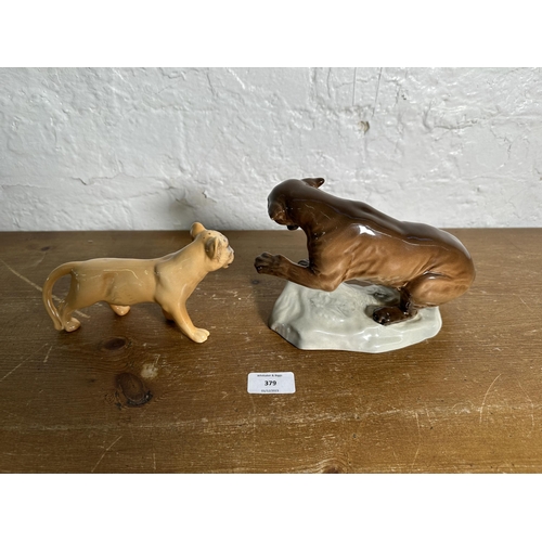 379 - Two Beswick wild cat figurines, Puma on Rock no. 1823 and Lion Cub no. 2098