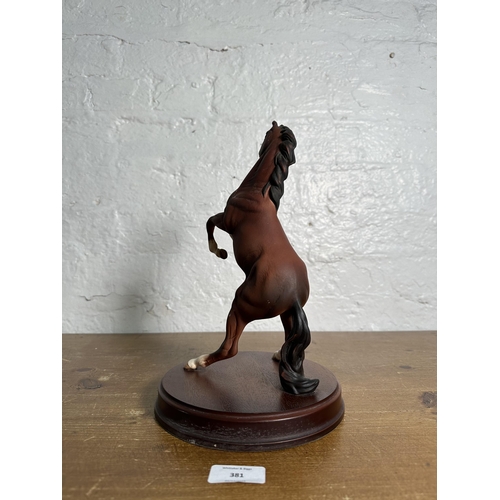 381 - A Royal Doulton Spirit of the Wild horse figurine on mahogany plinth - approx. 30cm high