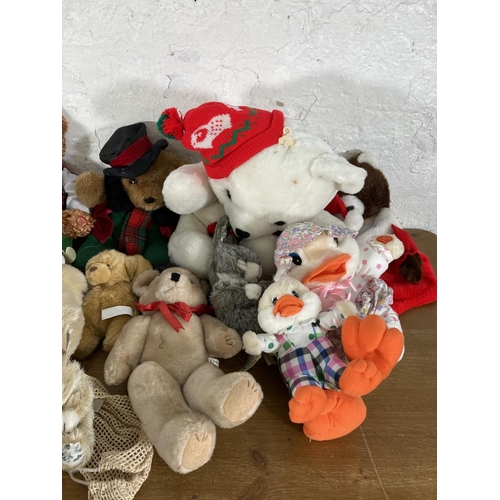 487 - A large collection of soft toys