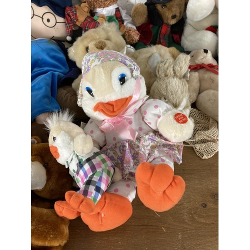 487 - A large collection of soft toys