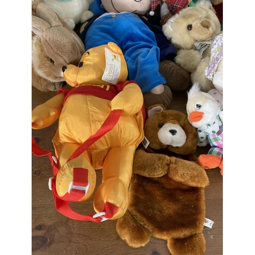 487 - A large collection of soft toys