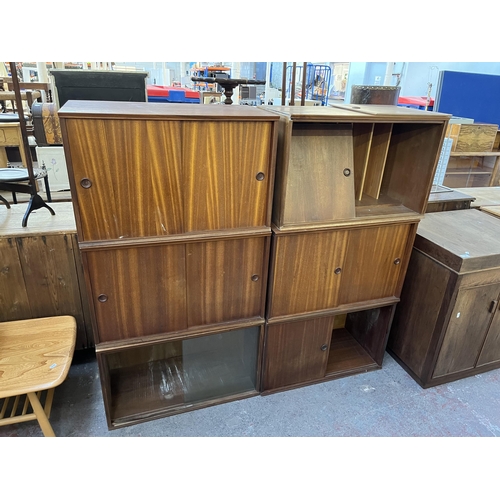 144 - Six mid 20th century teak wall hanging cabinets - each approx. 44cm high x 70cm wide x 38cm deep