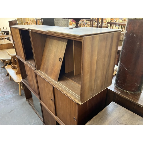 144 - Six mid 20th century teak wall hanging cabinets - each approx. 44cm high x 70cm wide x 38cm deep