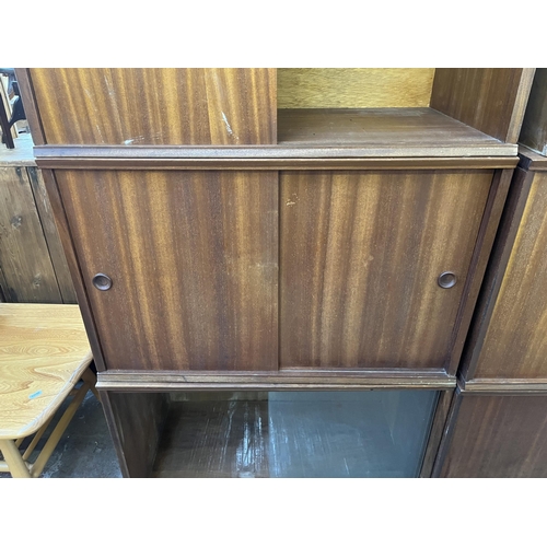 144 - Six mid 20th century teak wall hanging cabinets - each approx. 44cm high x 70cm wide x 38cm deep