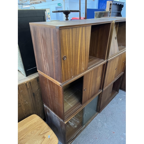 144 - Six mid 20th century teak wall hanging cabinets - each approx. 44cm high x 70cm wide x 38cm deep