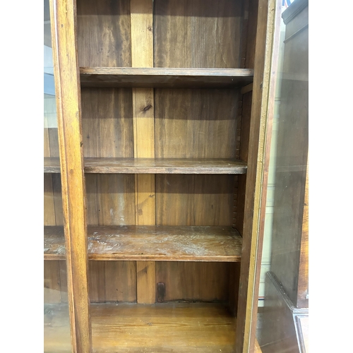1 - A Victorian satinwood bookcase with two upper glazed doors and two lower cupboard doors - approx. 22... 