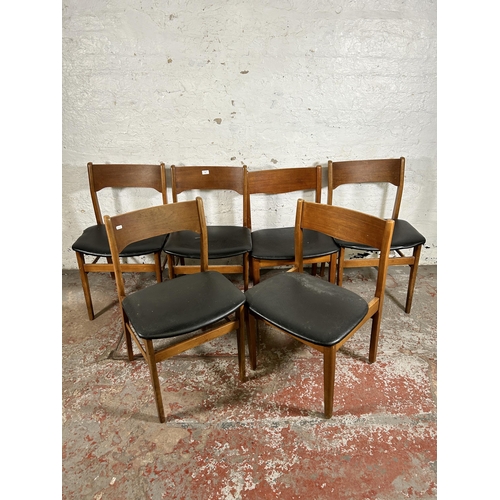 101 - Six mid 20th century teak and black vinyl dining chairs