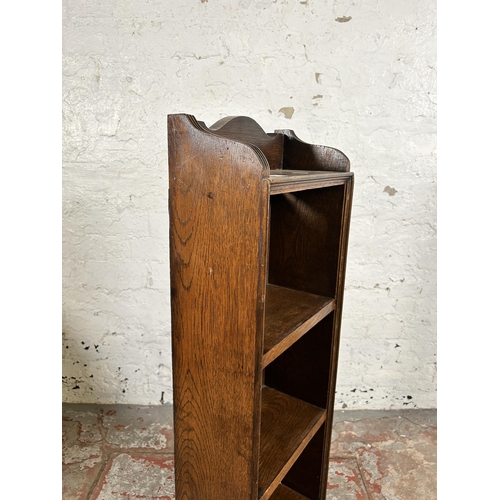 102 - A mid 20th century oak miniature four tier bookcase - approx. 93cm high x 31cm wide x 16cm deep